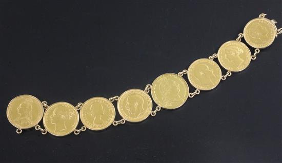 A gold mounted coin bracelet, set with eight assorted gold coins, 20cm.